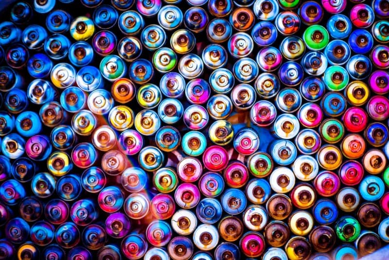 an array of color spray paint cans